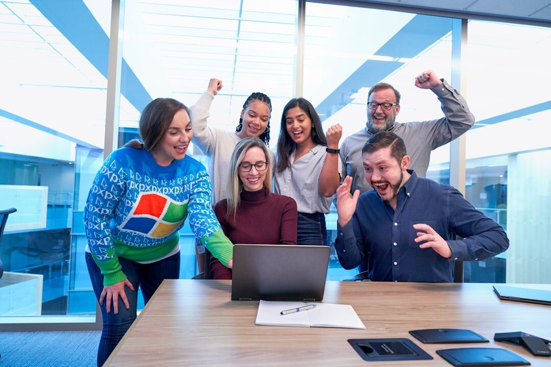 Team of professionals collaborating in a modern digital workspace